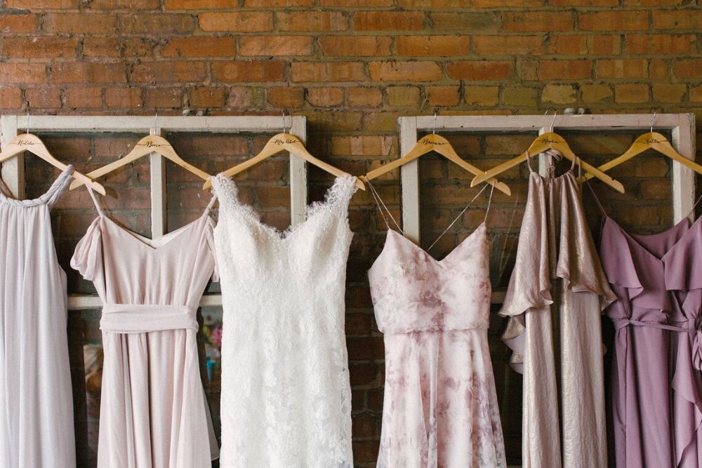 Wedding and bridesmaid dresses hanging up