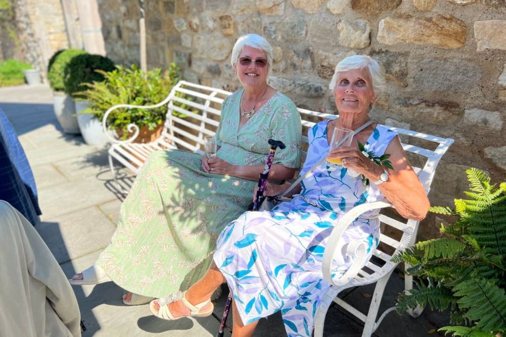 Wedding guests in the sunshine